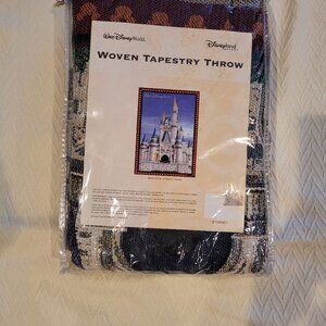 Brand new Beautiful Disney woven tapestry throw.  Never opened.  46" by 67".